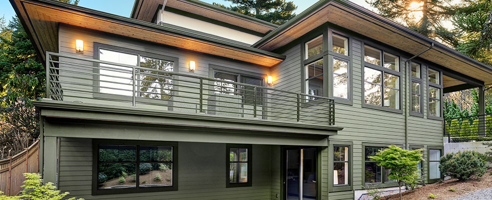 House with green vinyl siding